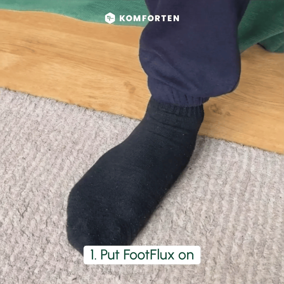 Person putting FootFlux on over a sock